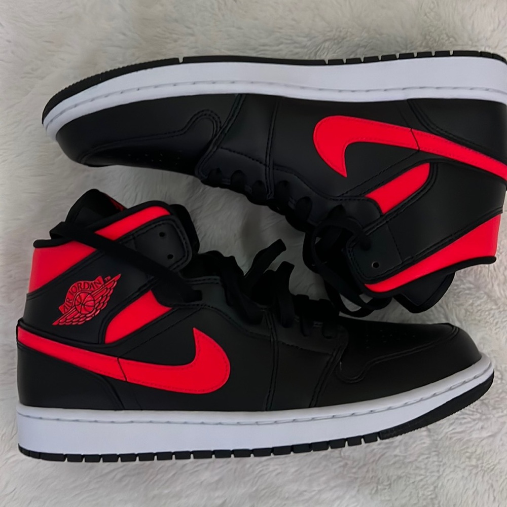Black and red Jordan 1’s